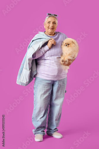 Senior woman with Pomerania...