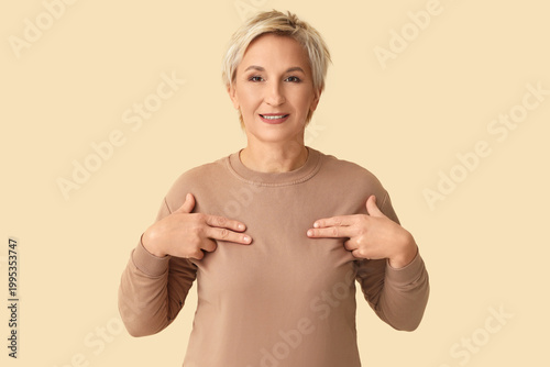 Smiling mature woman checki...