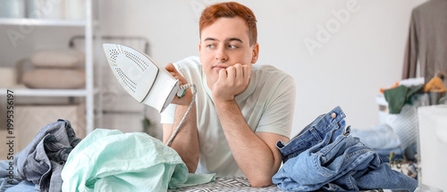 Bored young man with electr...