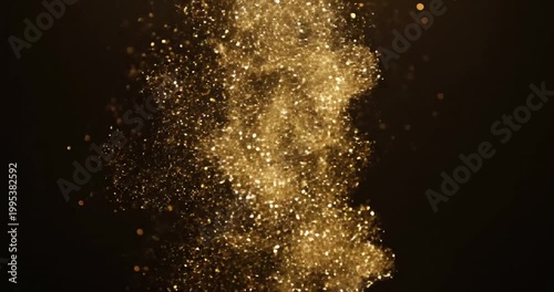 Golden particles cascading down against a dark background, creating a mesmerizing visual effect
