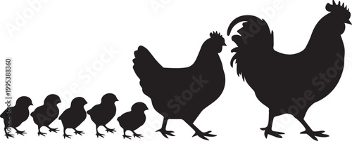 Black silhouette of a horse with foal grazing in a field at sunset mare