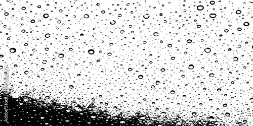 Abstract raindrops gracefully cascade, creating a delicate dance of textures in a macro artistic photograph. The droplets glisten and reflect light.