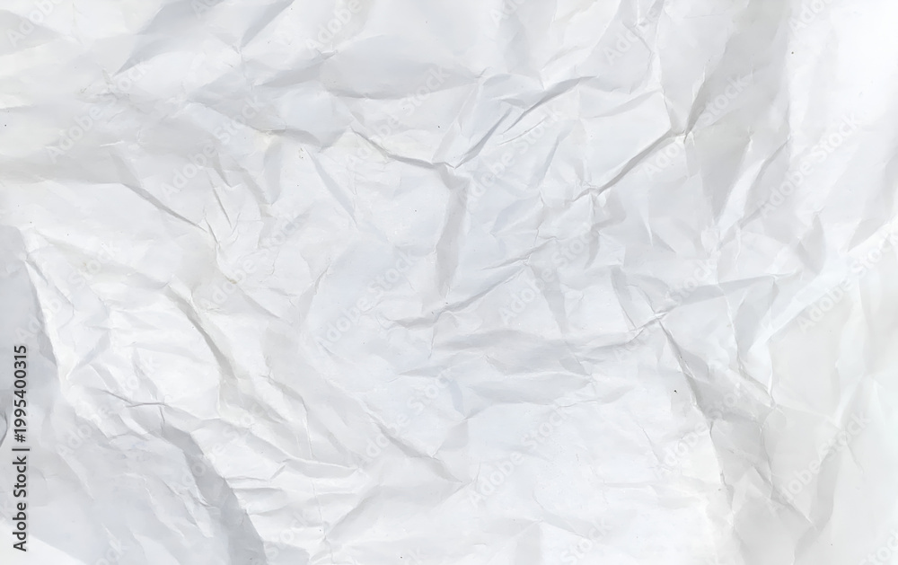 Fototapeta premium White crumpled and wrinkled paper texture background.