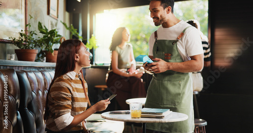 Fotografie Woman, credit card and waiter with pos at coffee shop, order and happy customer experience at diner