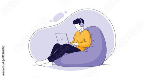 Young man sitting comfortably in a purple bean bag chair while working on a laptop and wearing headphones for music or gaming.