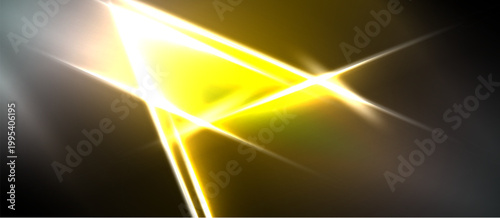 Bright yellow light streaks across dark background. Sharp angles, dynamic energy, modern design elements present. Intense glow radiates outward.