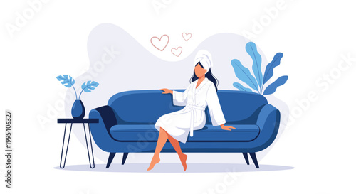 Relaxed woman wearing a white bathrobe and hair towel sitting on a comfortable blue sofa in a peaceful spa or home setting.