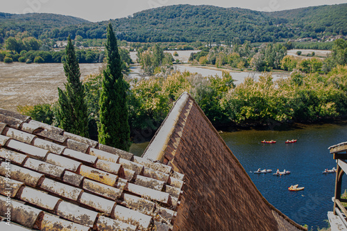 High angle view of Dordogne river and traditional roofs in Beynac