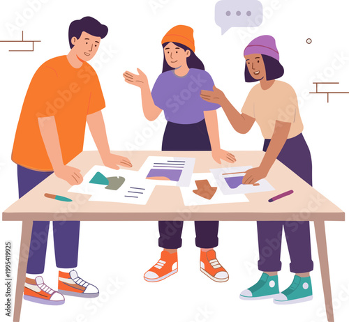 People discussing papers and charts at a table in a collaborative meeting