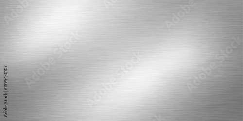 Polished stainless steel plate with a brushed metal texture featuring a shiny silver metallic surface and gray industrial aluminum pattern reflection