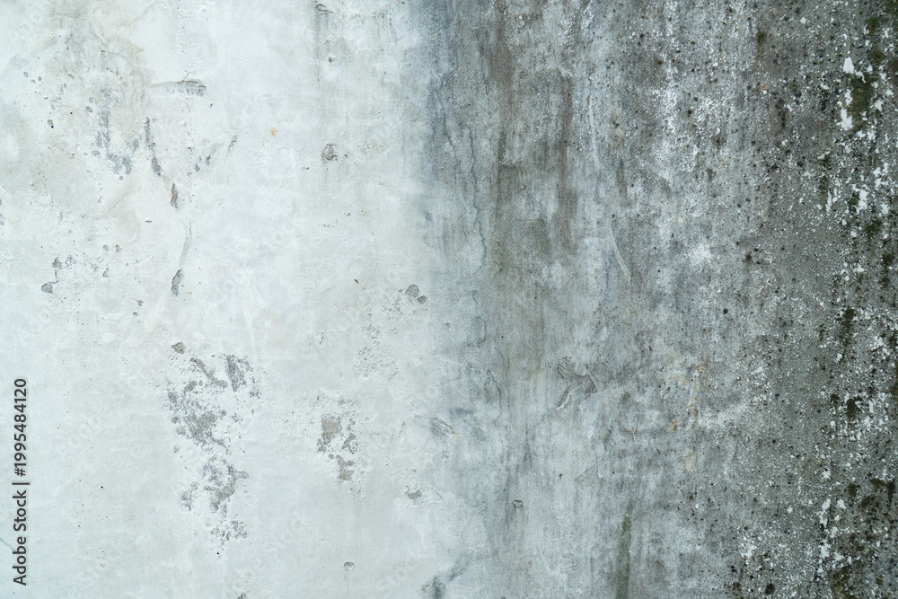 Fototapeta premium Grunge gray wall texture with gradient stains and rough weathered surface, ideal for abstract background, urban decay concept, and copy space design.
