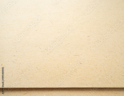 Symmetrical carbon fiber weave texture, dark charcoal black synthetic technical fabric close-up, high-tech engineering material, geometric repeating pattern, clean lines.