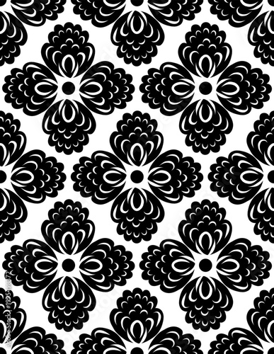 Vector seamless tile pattern of black folk art floral mandalas on white background. Texture with decorative floral rosettes.