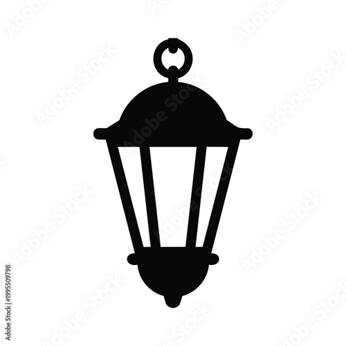 Black silhouette of a vintage street lamp on white background