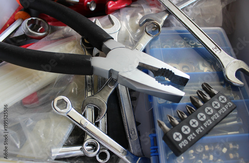 Scattered used hand tools and wrenches. Stock photo for carpentry equipment illustration 