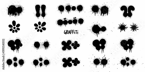 Collection of abstract black spray paint splatters and graffiti elements