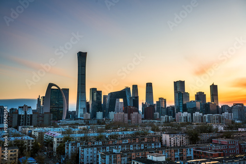 Panoramic view of Beijing city landmarks and residential areas at sunset, China
