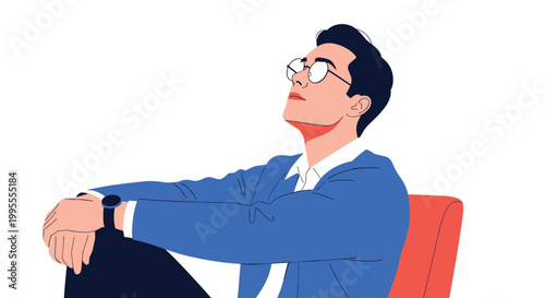 Young man wearing a blue sweater and glasses sitting comfortably and looking upwards with a peaceful expression.