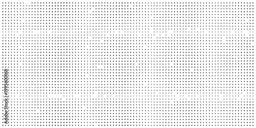 Dense pattern of small dark dots covering a bright white background