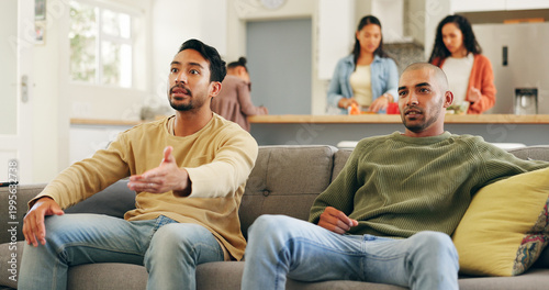 Cuadro en lienzo Upset, frustration and men watching sports on sofa in house with losing, bad game or disappointed