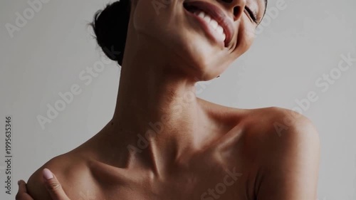 Close-up of smiling woman neck and shoulders, natural beauty and skincare concept, healthy skin, elegance and feminine confidence, minimal portrait