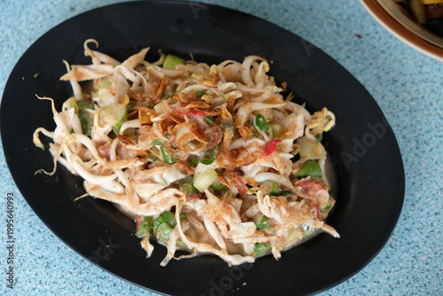 Karedok is a typical Sundanese, West Javanese raw vegetable dish, which is often referred to as a typical Indonesian salad because it consists of a mixture of fresh vegetables drizzled with sweet and 