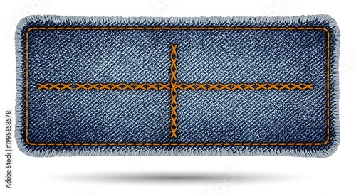 Denim blue jeans label with orange stitching on plain surface