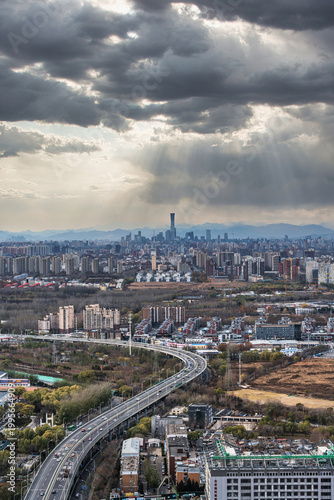 Overcast panoramic view of Beijing cityscape and elevated highway viaducts, China