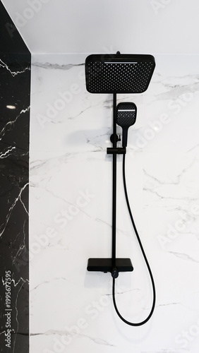 Luxury bathroom with minimalist black shower and marble glaze