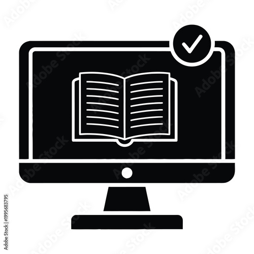 Computer monitor with open book on screen and notification