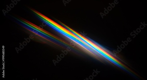 Prismatic light spectrum against black background