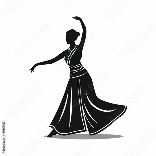 Silhouette of a Woman Dancing in a Flowing Dress