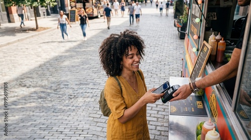 Black Woman Food Truck Lifestyle Candid Payment Smartphone NFC Terminal for Fintech and Street Food Experience Concept