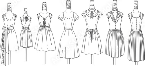 Collection of seven women's dress on mannequins