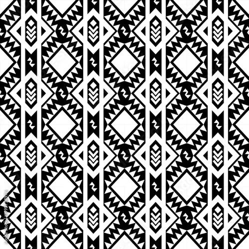 Seamless geometric pattern with black and white ethnic tribal motifs. Abstract vector background featuring repetitive diamond shapes, triangles, and square elements. Ideal for fabric print, wallpaper,