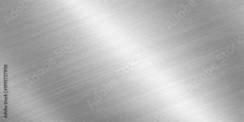 A polished stainless steel plate featuring a brushed metal texture with a shiny silver aluminum surface and industrial grey metallic pattern reflecting light across the smooth material sheet