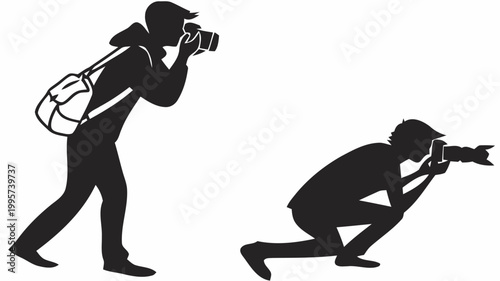 Two photographers silhouettes taking pictures with camera equipment