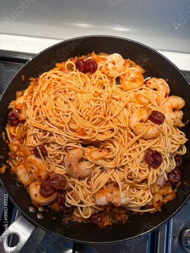 A pan of spicy prawn noodles.