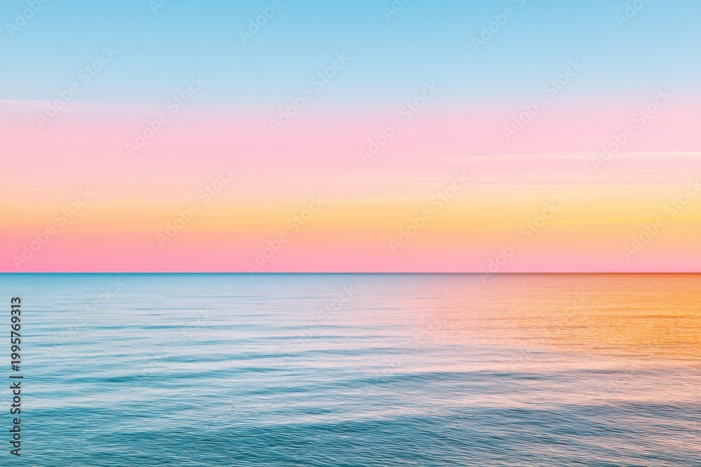 Fototapeta premium Minimalist seascape horizon. Calm ocean meeting the sky perfectly. Pastel colors of sunset (pink, pale blue). No land in sight. Photography.