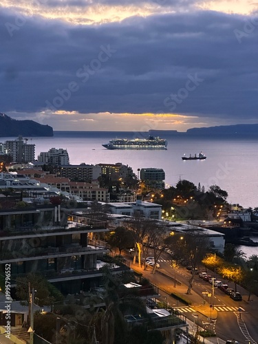 Cruise ship at dawn in Funchal bay, Madeira island, Portugal