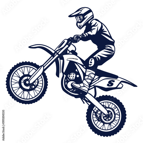 Green motocross rider on a dirt bike in mid air action shot