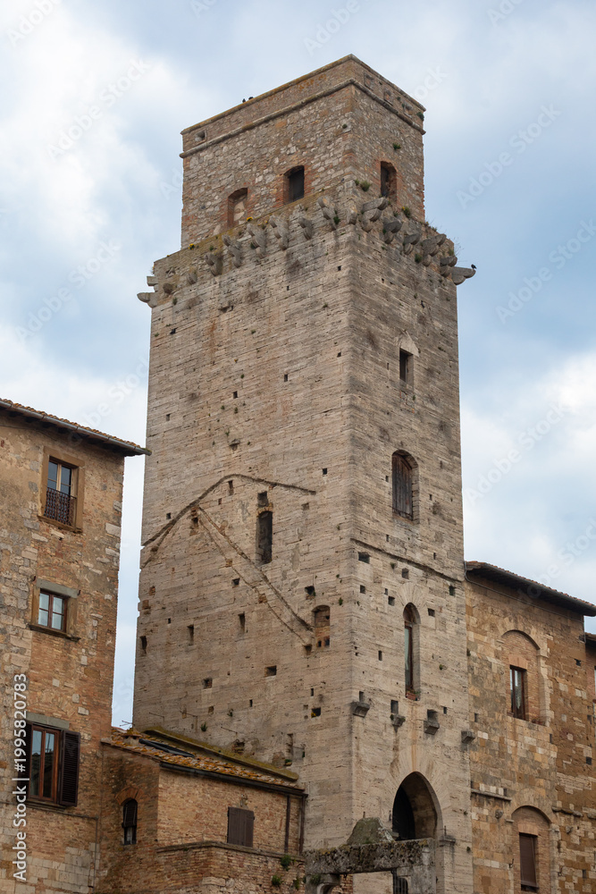 Fototapeta premium Medieval stone tower dominating San Gimignano's historic skyline