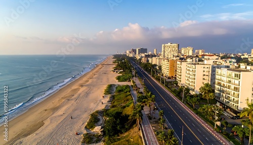 Aerial view of beachside cityscape road.