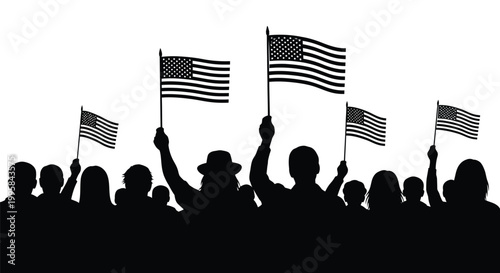 People wave American flags in a crowd on a sunny day outside.
