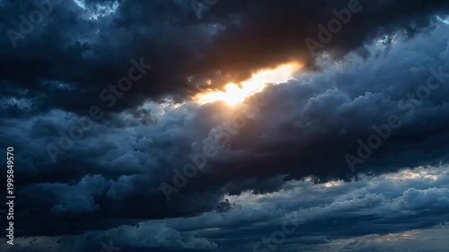 Sunlight breaking through storm clouds