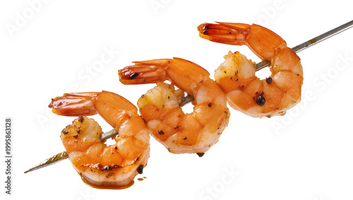 Photos Grilled seasoned shrimp skewers on metal rod