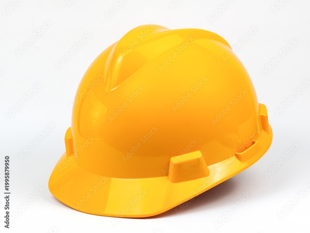 Fototapeta premium Yellow safety hardhat isolated on white background