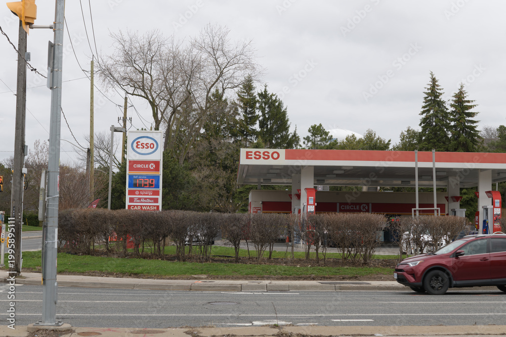 Naklejka premium exterior of Esso gas station located here at 800 Lawrence Av E at Leslie Av, North York, Toronto