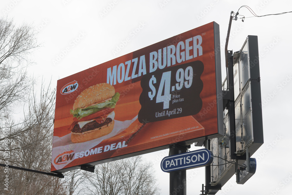 Naklejka premium road-side digital pylon out-of-home billboard on Leslie Av for A&W fast food restaurants, Toronto