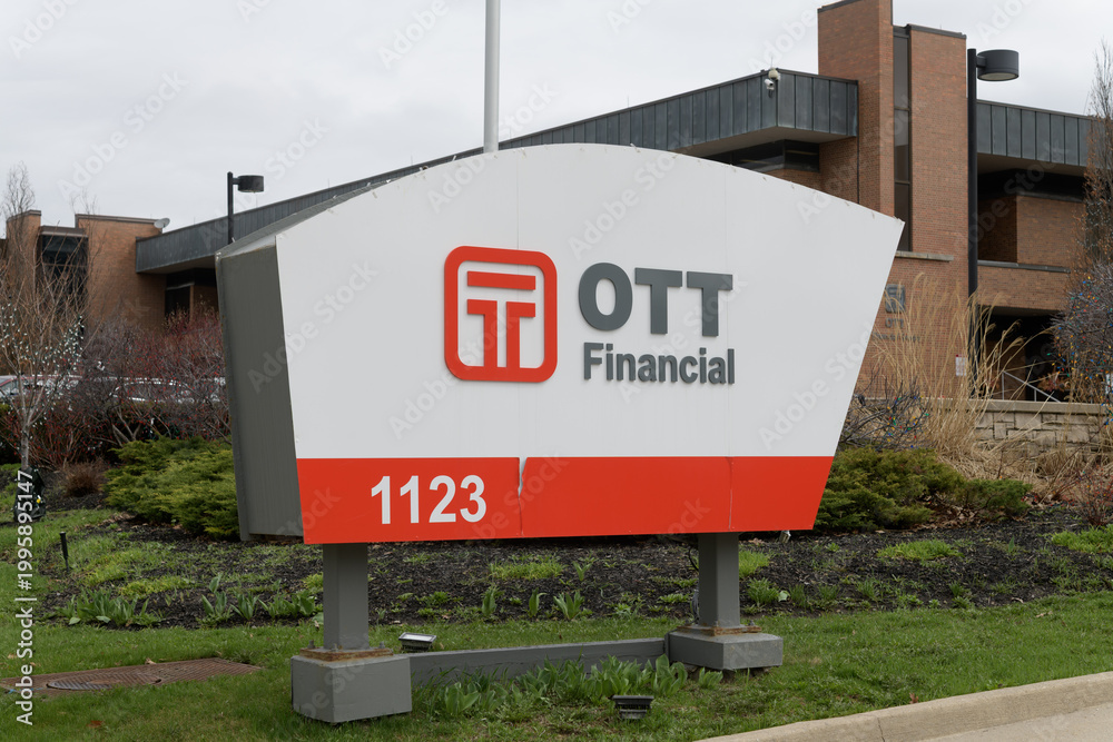 Obraz premium roadside pylon sign outside OTT financial headquarters at 1123 Leslie St; a hub for fintech and wealth management in Toronto, April 2026